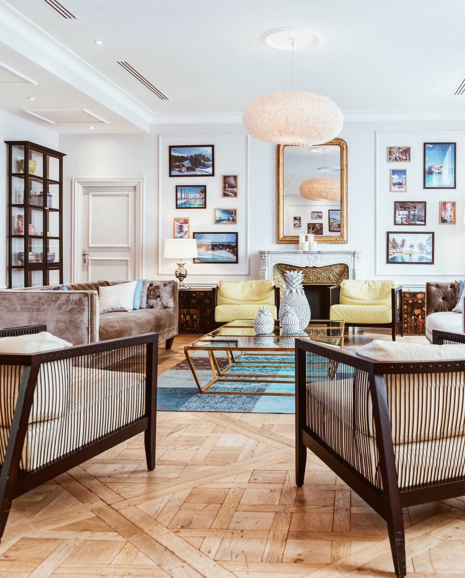 Living room finished with a large rug laid by a delivery team